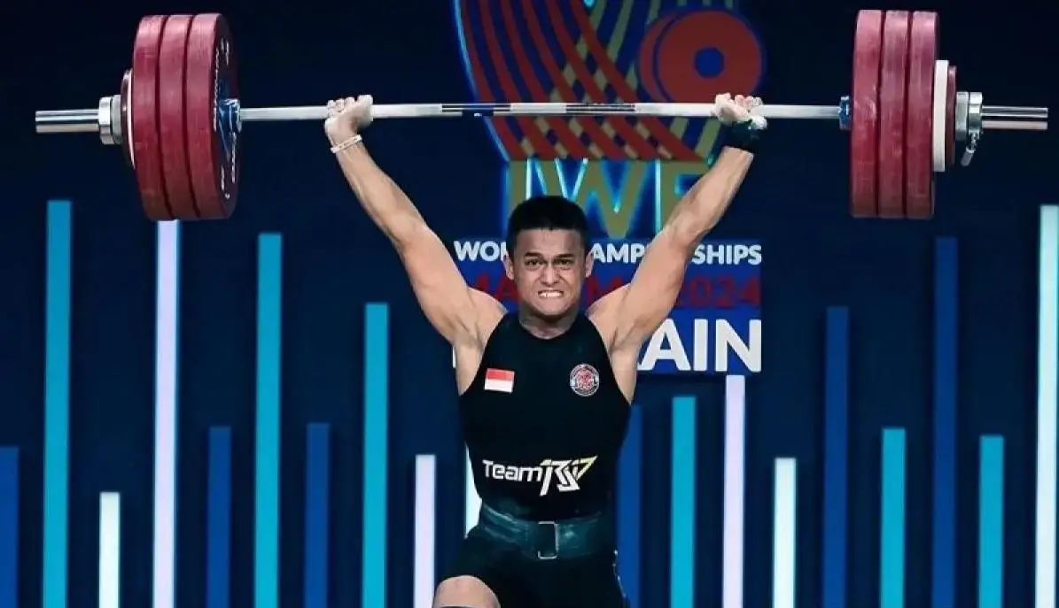 rizki-juniansyah-wins-double-gold-breaks-world-record-at-2025-iwf-world-championships