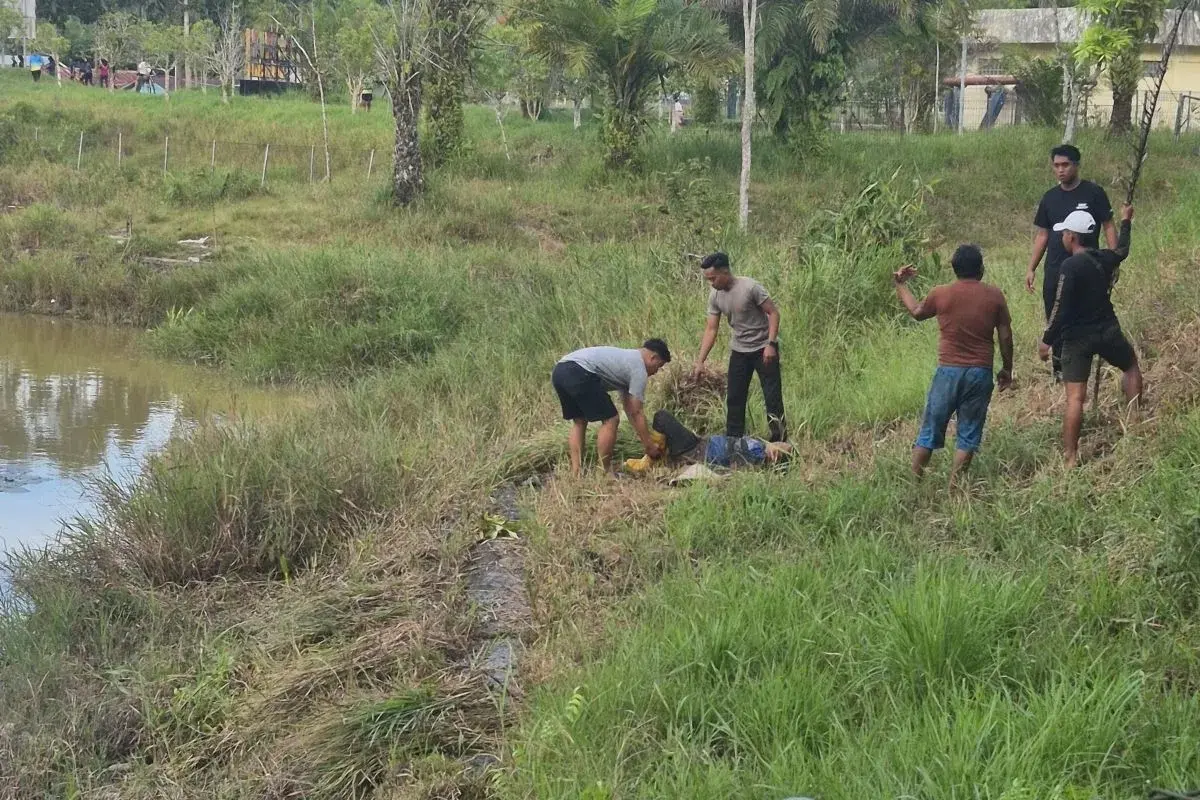 police-rescue-woman-from-crocodile-attack-at-reservoir-in-tarakan