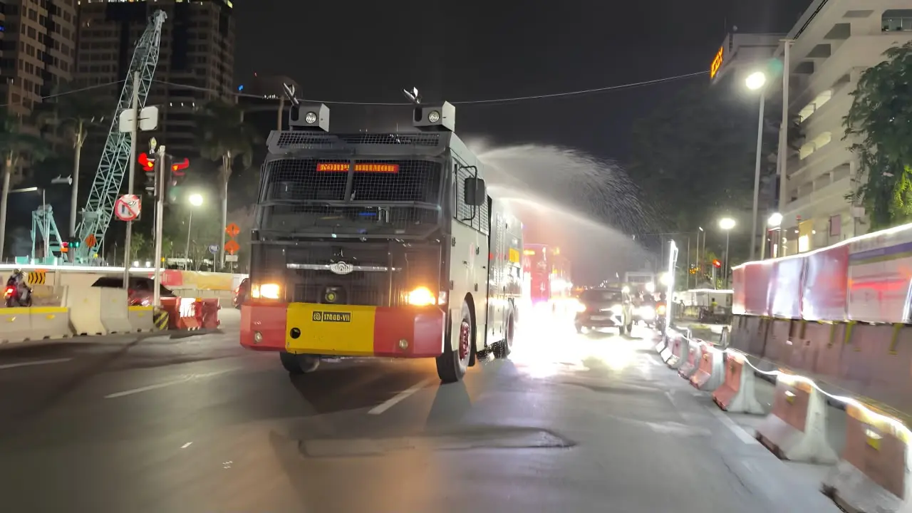 brimob-deploys-water-cannons-and-distributes-masks-amid-volcanic-ash-in-jakarta