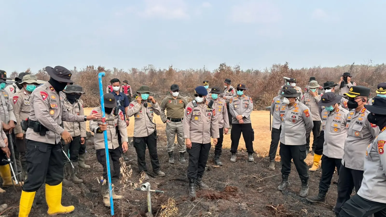 south-sumatra-police-demonstrate-x-fire-chemical-mixing-for-peatland-firefighting